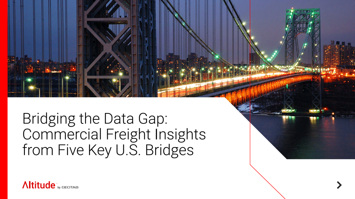 An image of a brightly lit suspension bridge at night, with a city skyline in the background. Overlaid text reads: 'Bridging the Data Gap: Commercial Freight Insights from Five Key U.S. Bridges.' Branded with 'Altitude by Geotab' in the bottom left corner.